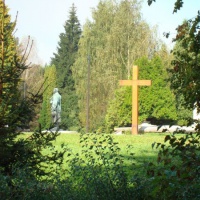 A cross, re-settled in the graveyard in 2004