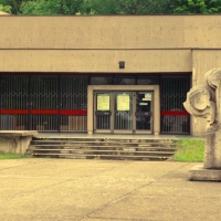 The entrance to the Tower with a plastic of  Lime tree branch – a symbol of a Slavonian solidarity created by an academic sculptor F. Patočka.