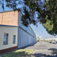 Budova H1 – náter opláštenia, mreží a potrubia - Predná časť budovy po oprave