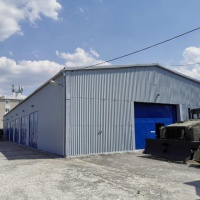 Oprava opláštenia na budovách H2 a H3 - Hala 3 po oprave - pohľad z boku