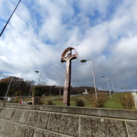 Osadenie nového kríža - cintorín Tokajík