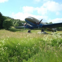The symbol of the air force support, a Soviet aircraft Li-2 in the village Vyšný